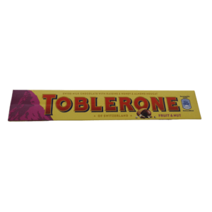 A bar of Toblerone Swiss Milk Chocolate, featuring the iconic triangular shape with a milk chocolate coating.